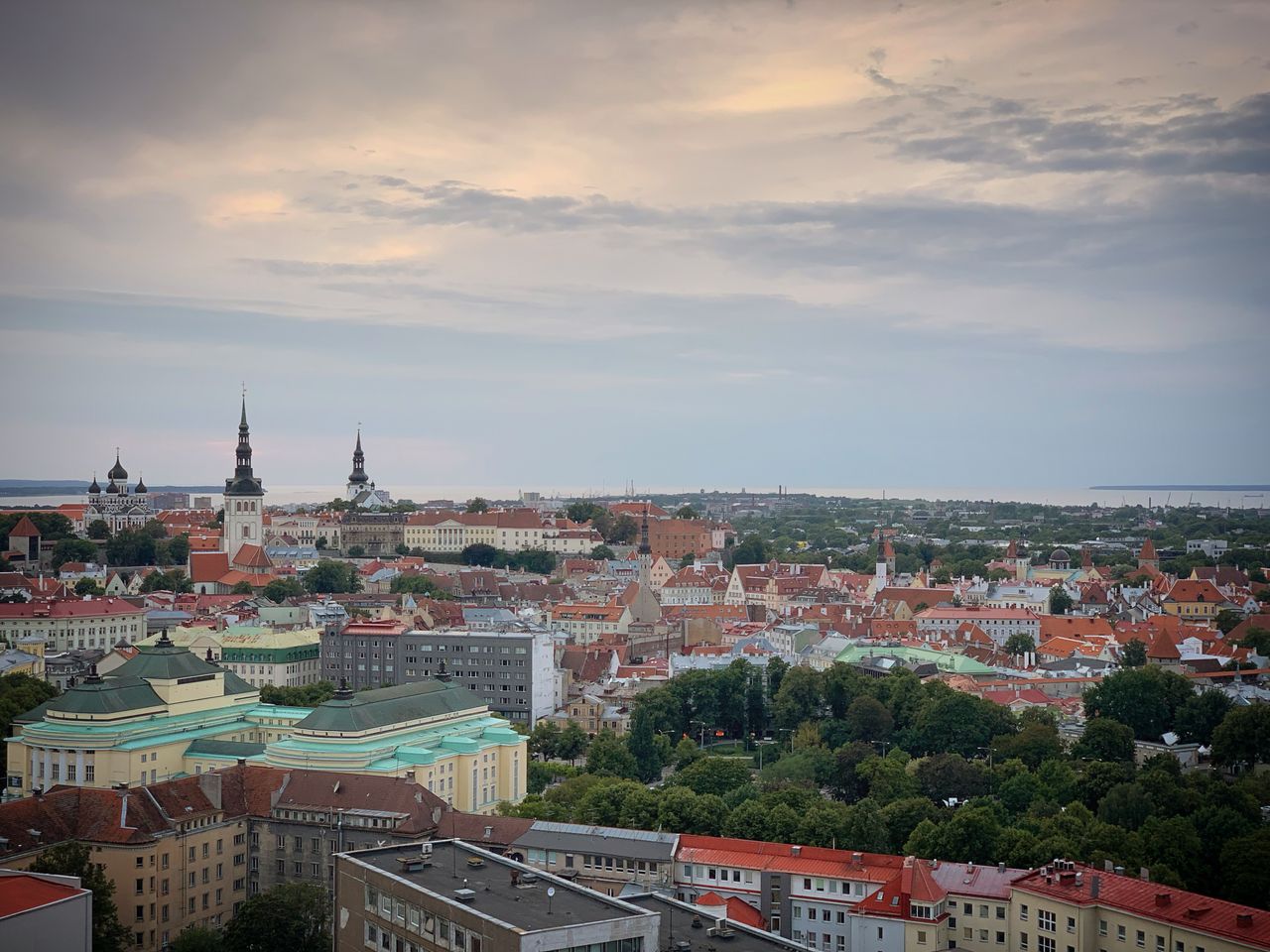 Stunning aerial view of Tallinn, Estonia, showcasing historic architecture and a serene sky.